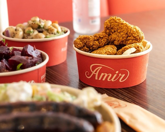 Amir food photography showing a pita bread sandwich.